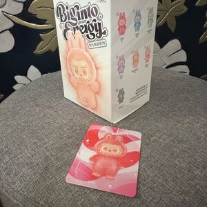 Big into Energy confirmed but unopened Love keychain.